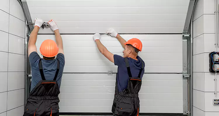 Garage Door Bottom Panel Repair in Four Corners, FL